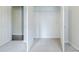 Bright closet featuring shelving in a carpeted bedroom at 5335 Lexington View Pl, Sugar Hill, GA 30518
