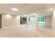 Open basement space with support columns, tile flooring, and recessed lighting at 5380 Northchester Ct, Dunwoody, GA 30338