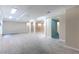 Basement with support columns, tile flooring, recessed lighting and doorways at 5380 Northchester Ct, Dunwoody, GA 30338