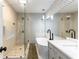 Beautiful bathroom featuring a soaking tub, a glass shower and modern fixtures at 5380 Northchester Ct, Dunwoody, GA 30338