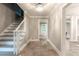 Grand foyer showcasing classic staircase and an open floor plan with natural light at 5380 Northchester Ct, Dunwoody, GA 30338
