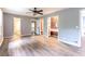 Bright main bedroom featuring hardwood floors, walk-in closets and grey painted walls at 5380 Northchester Ct, Dunwoody, GA 30338