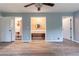 A roomy main bedroom with hardwood floors, a ceiling fan and multiple closets at 5380 Northchester Ct, Dunwoody, GA 30338