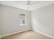 Neutral bedroom with wood floors, fresh paint, and a large window at 789 Third St, Stone Mountain, GA 30083
