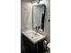 Contemporary bathroom with floating vanity, modern mirror, and sleek fixtures at 1280 W Peachtree Nw St # 2409, Atlanta, GA 30309