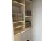 Organized closet with shelving, featuring neutral storage bins and ample space at 1280 W Peachtree Nw St # 2409, Atlanta, GA 30309