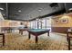 Modern game room with pool tables, seating, and art at 1280 W Peachtree Nw St # 2409, Atlanta, GA 30309