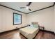 Bright bedroom features hardwood floors, a ceiling fan, and generous natural light at 1722 San Gabriel Ave, Decatur, GA 30032