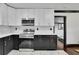 Kitchen with stainless appliances, two-tone cabinetry, and quartz countertops at 1722 San Gabriel Ave, Decatur, GA 30032