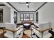Bright living room boasts stylish decor, modern furniture, and large windows at 1722 San Gabriel Ave, Decatur, GA 30032