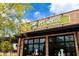 Commercial space for Pet Wants featuring a brick facade and inviting storefront windows at 215 Rolison Way, Fayetteville, GA 30214