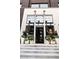 Elegant storefront with potted plants, large windows, and the sign for 'Native' at 215 Rolison Way, Fayetteville, GA 30214