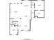 Open-concept first-floor plan featuring a large living room, kitchen, dining area, and breakfast nook at 481 Saddle Ridge Dr, Lawrenceville, GA 30046
