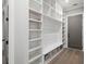 Well-organized mudroom with built-in shelving and storage, perfect for busy lifestyles at 481 Saddle Ridge Dr, Lawrenceville, GA 30046