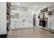 Spacious walk-in closet with custom shelving and storage for shoes, hats, and hanging clothes at 481 Saddle Ridge Dr, Lawrenceville, GA 30046