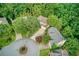 Aerial view of a home showcasing its mature trees, well-maintained landscaping, and neighborhood layout at 58 Parkside Cir, Marietta, GA 30068