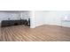 Large finished basement with wood flooring, media area and office space at 58 Parkside Cir, Marietta, GA 30068