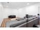 Cozy basement living room with comfortable sofa, and entertainment center at 58 Parkside Cir, Marietta, GA 30068