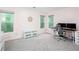 Bright bedroom is currently set up as a work space with three windows at 58 Parkside Cir, Marietta, GA 30068