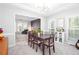 Formal dining room featuring a large table and elegant decor, perfect for entertaining guests at 58 Parkside Cir, Marietta, GA 30068