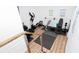 Home gym features a treadmill, elliptical and weight lifting equipment at 58 Parkside Cir, Marietta, GA 30068