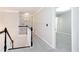 Upstairs hallway with new carpet, neutral paint, and white trim at 58 Parkside Cir, Marietta, GA 30068