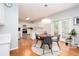 Kitchen with stainless steel appliances and a dining table next to a glass door at 58 Parkside Cir, Marietta, GA 30068