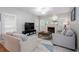 Living room features a fireplace and comfortable seating at 58 Parkside Cir, Marietta, GA 30068
