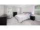 Bright bedroom with new carpet and neutral paint, offering a serene and inviting space at 58 Parkside Cir, Marietta, GA 30068