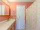 Bathroom featuring a vanity, shower with curtain, and a medicine cabinet at 70 Heritage Way, Covington, GA 30016