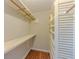 A closet featuring shelving and hanging rods for storage at 70 Heritage Way, Covington, GA 30016