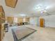Spacious three-car garage with ample lighting and space for storage and projects at 70 Heritage Way, Covington, GA 30016