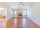 Living room with hardwood floors and fireplace provides a cozy retreat at 70 Heritage Way, Covington, GA 30016