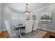 Formal dining room featuring hardwood floors, recessed lighting, and modern light fixture at 1066 High Point Ne Dr, Atlanta, GA 30306