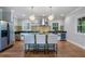 Spacious kitchen featuring a stainless steel refrigerator and a center island with seating at 1066 High Point Ne Dr, Atlanta, GA 30306