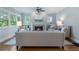 Cozy living room with fireplace, ceiling fan, and built-in shelving at 1066 High Point Ne Dr, Atlanta, GA 30306