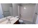 Well-lit bathroom with a shower-tub combination, a toilet, and a vanity with a sink at 2153 Pine View Trl, Ellenwood, GA 30294