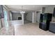 Open kitchen layout featuring sleek appliances and a view into the cozy living room at 2153 Pine View Trl, Ellenwood, GA 30294