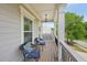 Cozy upper balcony with comfortable seating and scenic views, ideal for relaxation and enjoying the outdoors at 251 Parc Dr, Canton, GA 30114
