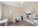 This room features neutral paint, ceiling fan, carpet, and built in cabinets at 251 Parc Dr, Canton, GA 30114