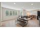 Open concept dining area with large table, bench seating, and lots of natural light at 251 Parc Dr, Canton, GA 30114
