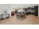 Modern kitchen with dark cabinets, stainless steel appliances, and an eat-in island at 251 Parc Dr, Canton, GA 30114
