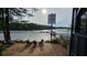 Scenic lake view with waterfront access, inviting residents to relax and enjoy the serene surroundings at 251 Parc Dr, Canton, GA 30114