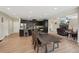 Spacious living area featuring an open layout, a modern kitchen, and a cozy living room at 251 Parc Dr, Canton, GA 30114