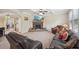 Cozy living room with a stone fireplace, coffered ceiling, and plush seating at 251 Parc Dr, Canton, GA 30114