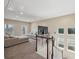 Cozy living room with large sectional sofa, natural light, and staircase view at 251 Parc Dr, Canton, GA 30114