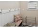 Practical mud room with bench, coat hooks, and shoe storage at 251 Parc Dr, Canton, GA 30114