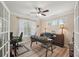Bright office with multiple windows and hardwood floors, providing an ideal workspace at 251 Parc Dr, Canton, GA 30114