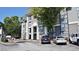 Apartment building with well maintained grounds and parking, surrounded by trees at 2657 Lenox Ne Rd # A-5, Atlanta, GA 30324