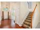 Grand foyer with hardwood floors, staircase and plenty of natural light at 3185 Highgreen Trl, Atlanta, GA 30349